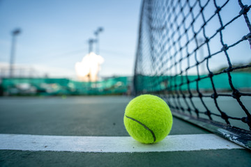 The beginning of a champion, Close up tennis ball on the courts background.