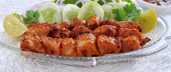 Foto auf Acrylglas Fish Tikka, Delicious and Spicy Boneless Fish Meat on Skewers, Ready for Serve © Jehangir Hanafi