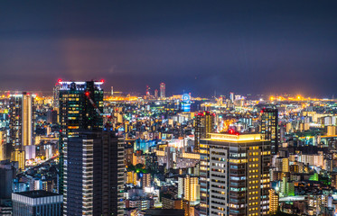 Fototapeta na wymiar OSAKA, JAPAN-SEPTEMBER 2, 2018,High angle Night view of Osaka,Japan,on Umeda Sky Building,long exposure photograph 