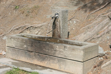 Holzbrunnen in Sand in Taufers