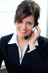 Female Call Center Agent Wearing A Phone Headset