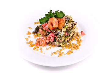 Salad of shrimps, green beans, cabbage and pine nuts