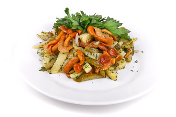 Salad of fried potatoes, mushrooms and gherkins