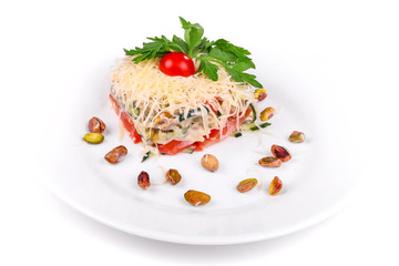 Salad of meat, cheese, cucumbers and tomatoes