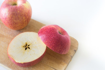 Slice apple on chopping block