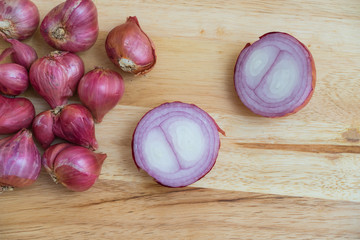 Slice shallot on wooden background, top view image shallot,