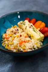 Andalusian fish, saffron rice with vegetables