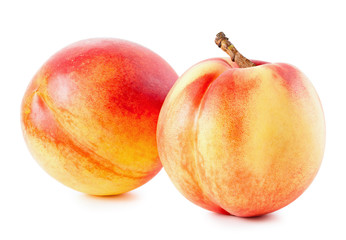 Peaches or nectarines isolated on white