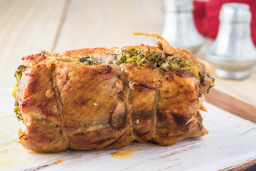 Roasted pork loin stuffed with prosciutto and broccoli