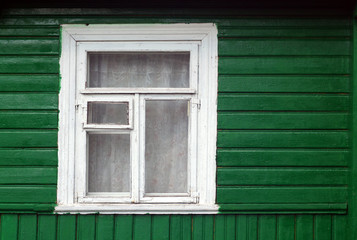 Old window of wooden house.
