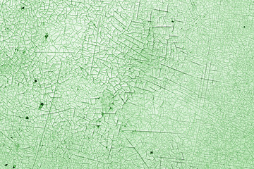 Crack and damage on painted texture in green tone.