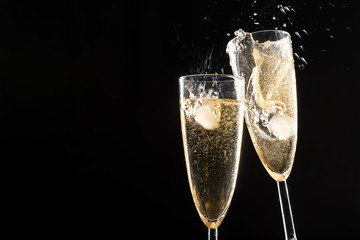 Glasses of champagne with splash