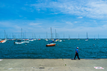 Man walking along Lake Michigan