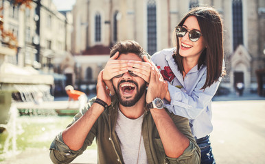 Meeting in the park. Romantic couple have fun in the city park. Love, dating, romance