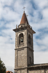Fototapeta na wymiar Bellano Como Lake - Italy SEPT 2018 - old church with bell in the small village of Bellano . lombardy.