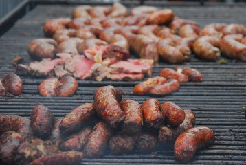 sausages on a grill