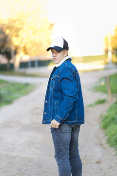 Portrait of a young male outdoors wearing casual attire