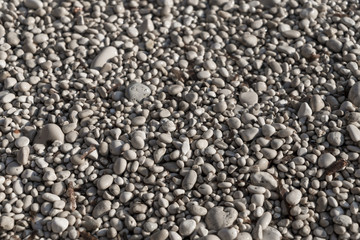 close up of white pebbles on a beach, for backgrounds