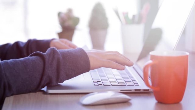 a woman using her credit card for online shopping