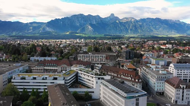 Aerial panoramic view of cityscape of Thun, picturesque town on river Aare - landscape panorama of canton of Bern from above, Switzerland, Europe