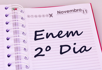 Education and concept. Schedule with markings in Portuguese. (translation: November 11, ENEM - National exam of high school in Brazil, second day)