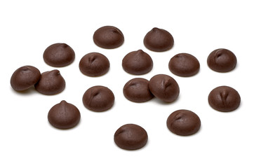 Chocolate chips morsels from top view isolated on white background