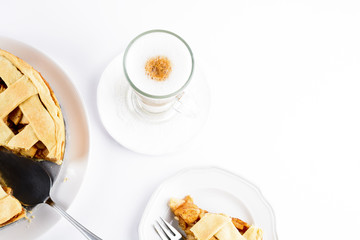 American apple pie with coffee Latte in glass Irish mug isolated on white background