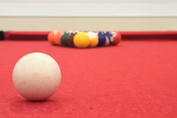 Billiards table with Cue ball in focus