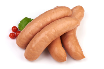 Fresh boiled sausages with basil and Physalia berry, isolated on white background. Close-up.