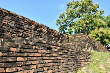 Ancient walls surrounding the moat of Chiang Mai