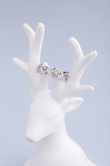 Silver ring in floral design with diamonds