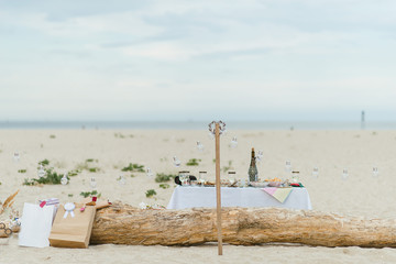picnic table setting on the beach