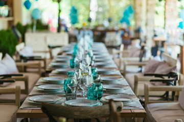 table setting with glasses and plates