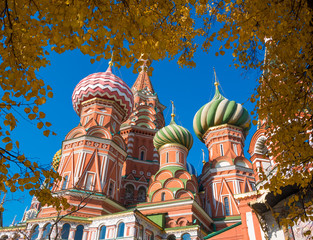 Fototapeta na wymiar View from the autumn trees on St. Basil's Cathedral