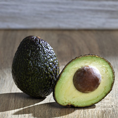 Fresh avocado on a wooden table