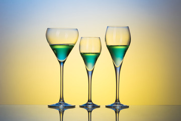 three glasses with cocktails 