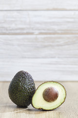 Fresh avocado on a wooden table