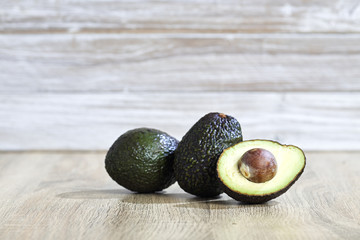 Fresh avocado on a wooden table