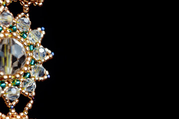 handmade jewelry made of beads in macro. earrings from white beads. earrings from stones