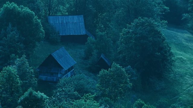 Autumn rural scene with wooden barn, haystacks in Transylvania region, Romania, cca. 2010.