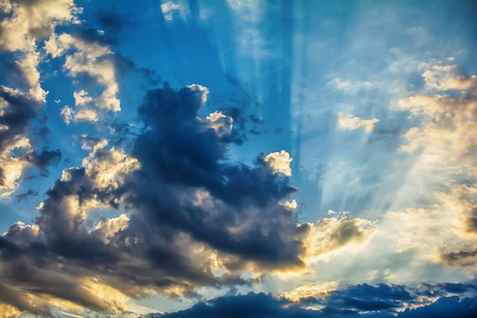 Dramatic sunset sky with yellow, blue and orange color