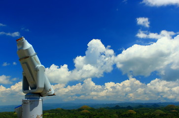 View point of Chocolate Hills in Bohol island, Philippines. Tourist telescope or binoculars that do not pointing the landscape