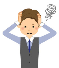 若い男性　頭を抱える
