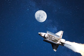 space shuttle flying on moon.space tourism.elements of this image furnished by NASA