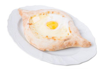 Georgian khachapuri pie with egg and cheese.