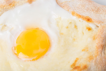 Georgian khachapuri pie with egg and cheese.