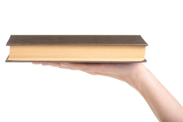Book in hand on white background isolation