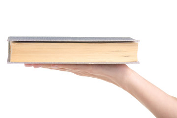 Book in hand on white background isolation