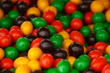 healthy christmas deserts. hazelnut kernels in multi colored glaze