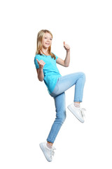 Cute girl in casual clothing showing thumbs up on white background